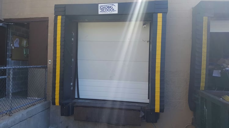 design the loading dock: determine the door sizes, small white dock door by Loading Dock, Inc.