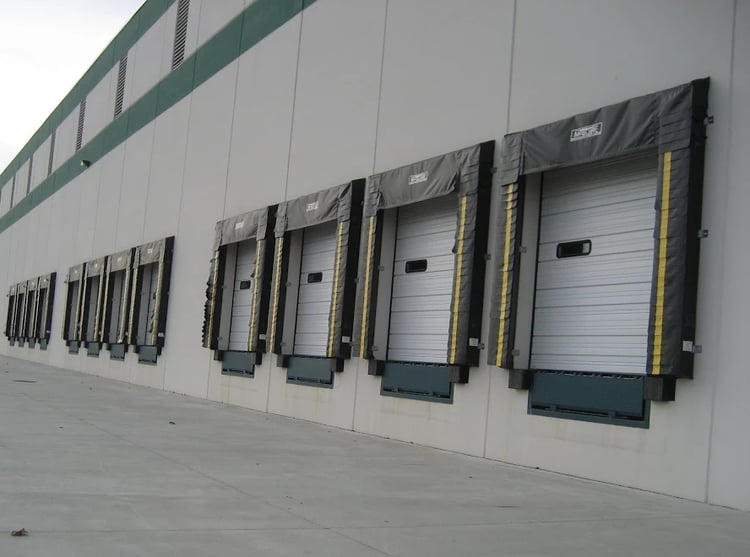loading dock door, white sectional doors exterior view